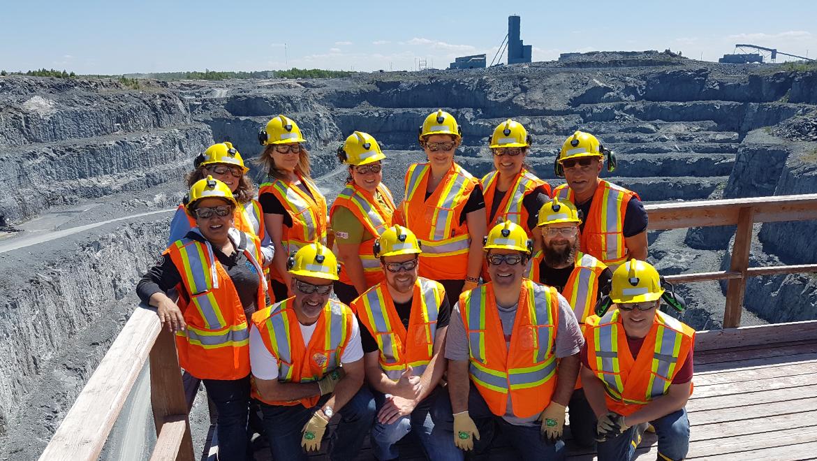 Teachers on a tour of an open pit mine.